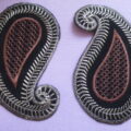 Ornament mustal põhjal 95X60mm, 2tk.